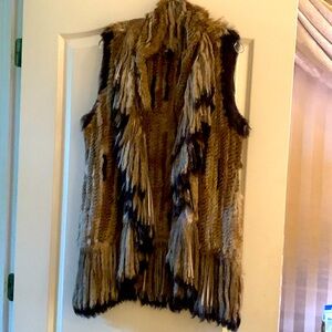 Rabbit fur vest with fringe. Never worn.